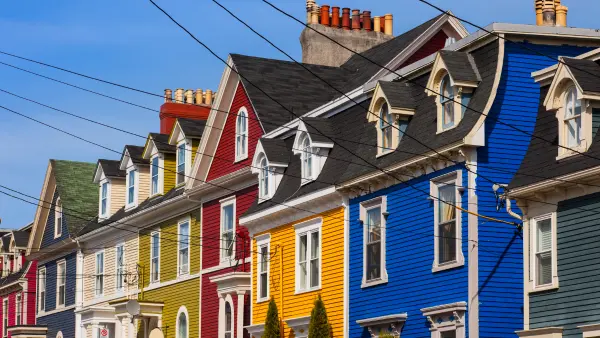 View of colourful houses in St. John’s, Newfoundland, representing the local real estate market.